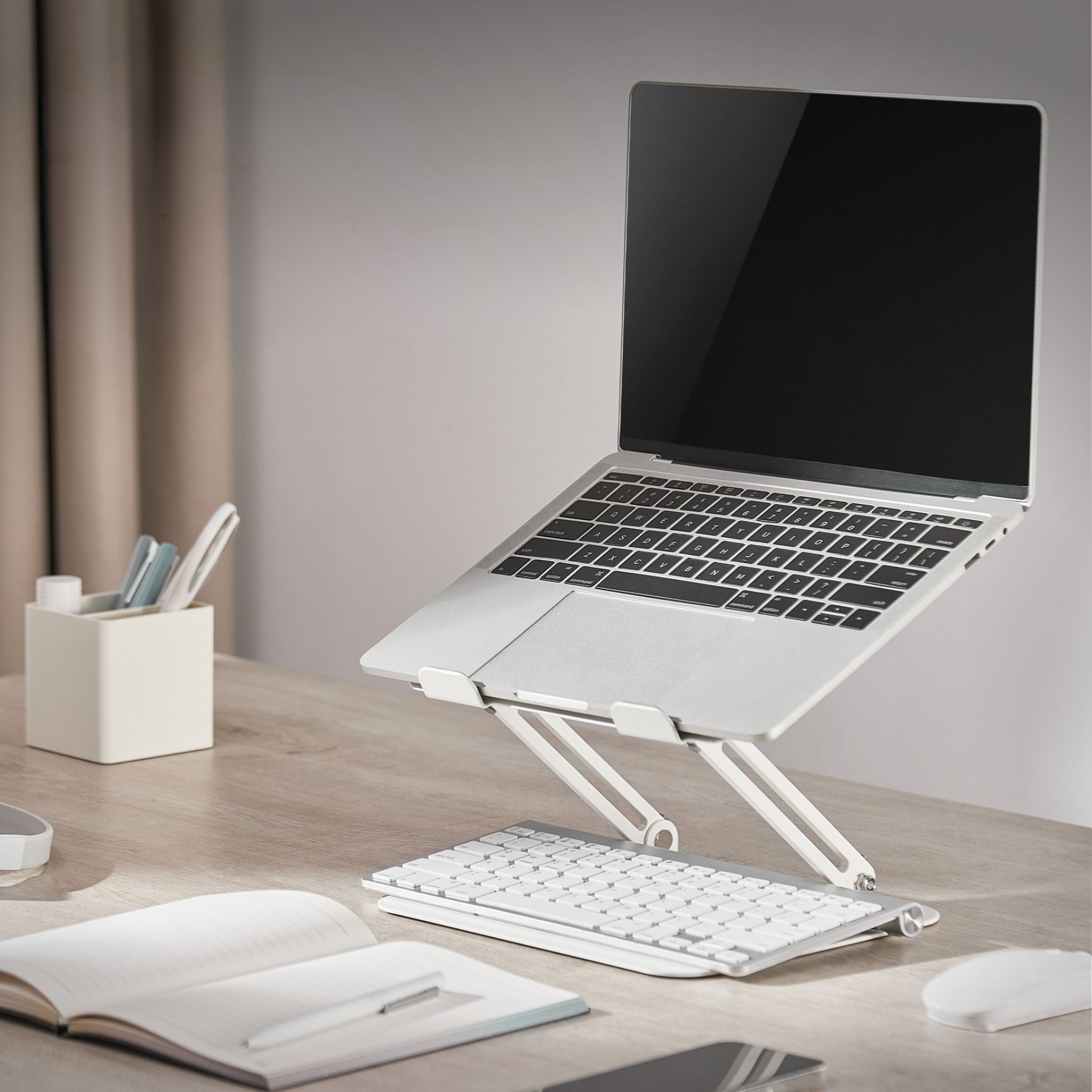 Ергономічна регульована підставка для ноутбука з металу
