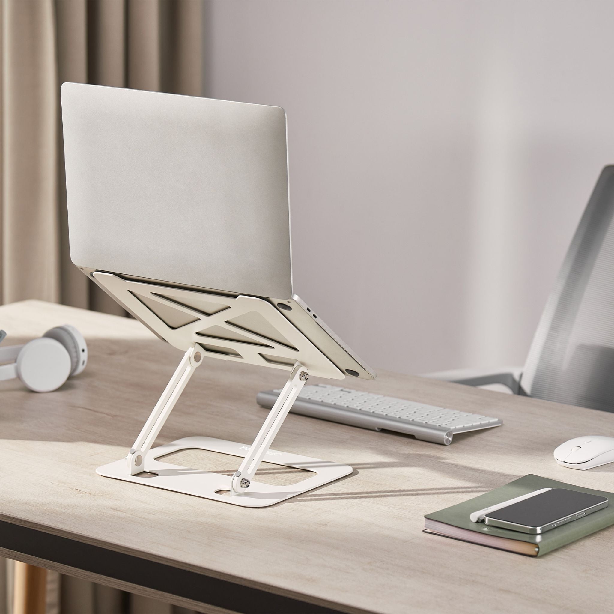 Ергономічна регульована підставка для ноутбука з металу